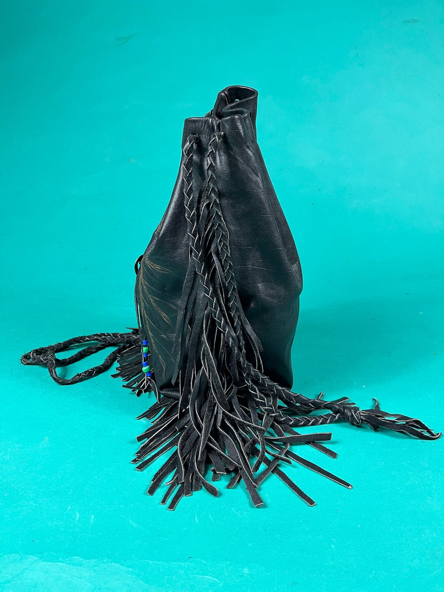 Vintage 70s Black Leather Braided Tassel Drawstring Painted Feather Concho Sidebag Purse